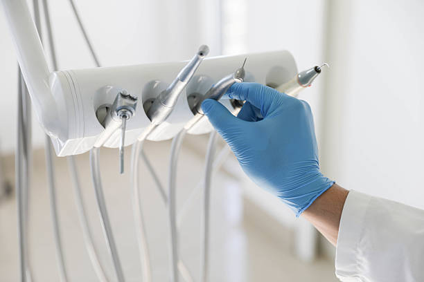 Professional Tooth Extraction technician working in New Brighton, MN